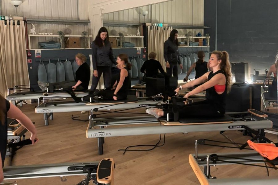 reformer pilates beds with students