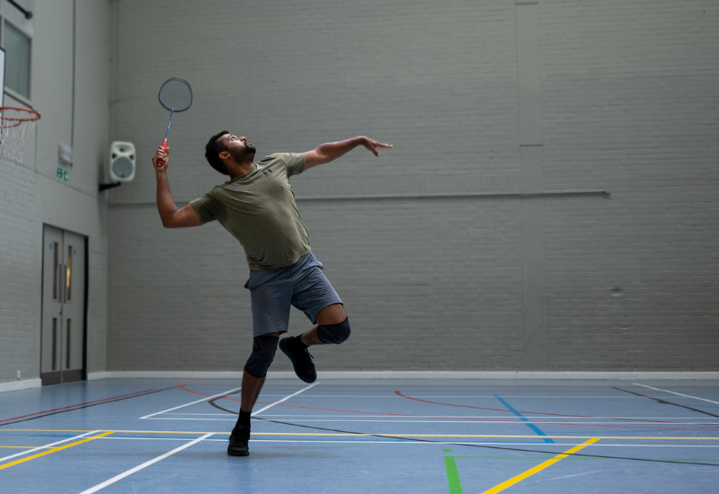 man playing badminton